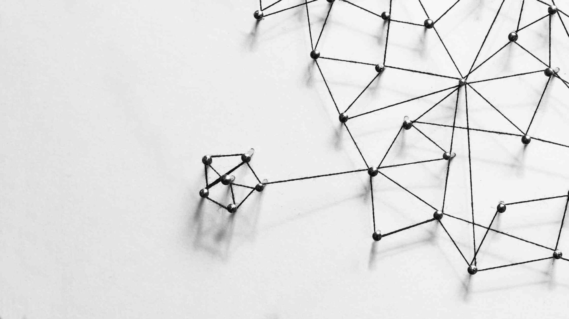 Web of black pins linked with wire, HOW TO REMOVE TOXIC BACKLINKS WITH DISAVOW LISTS