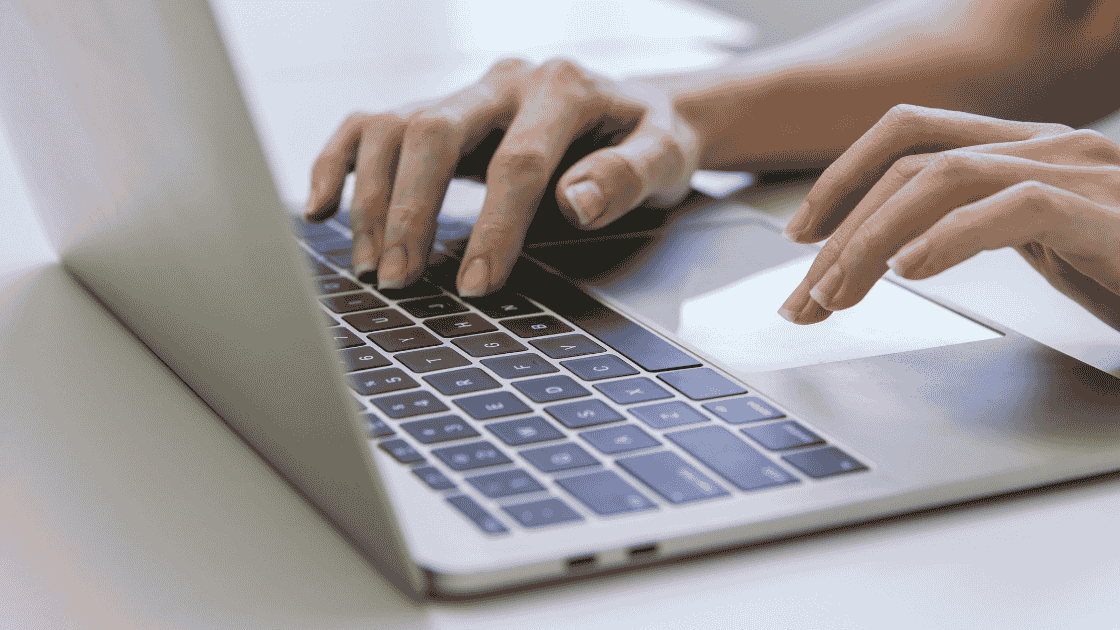 Office worker typing on keyboard