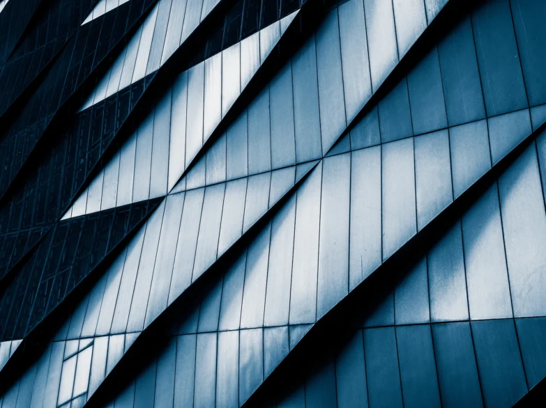 A building featuring a striking blue and white patterned exterior.