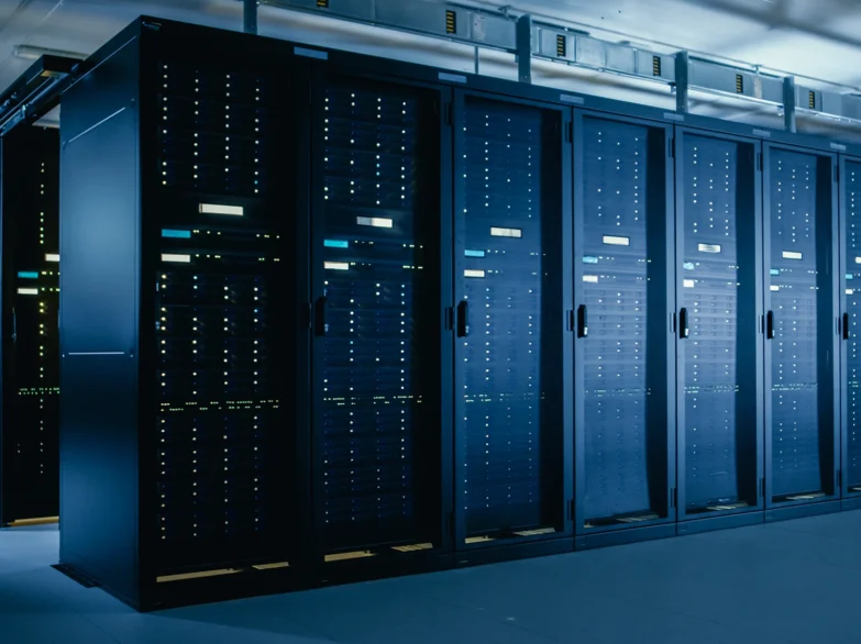 A spacious room filled with neatly arranged rows of servers, showcasing a high-tech data center environment.