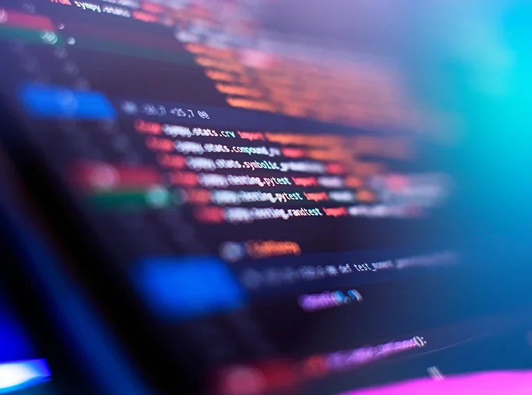 A computer screen displaying lines of code in a text editor, showcasing programming work in progress.